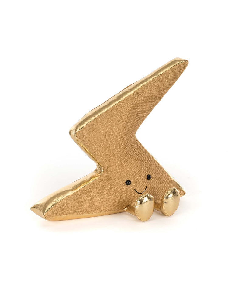 The Jellycat Amuseables Zapperty Lightning Bolt is a plush toy with a smiling face and small golden feet, shown on a plain white background.