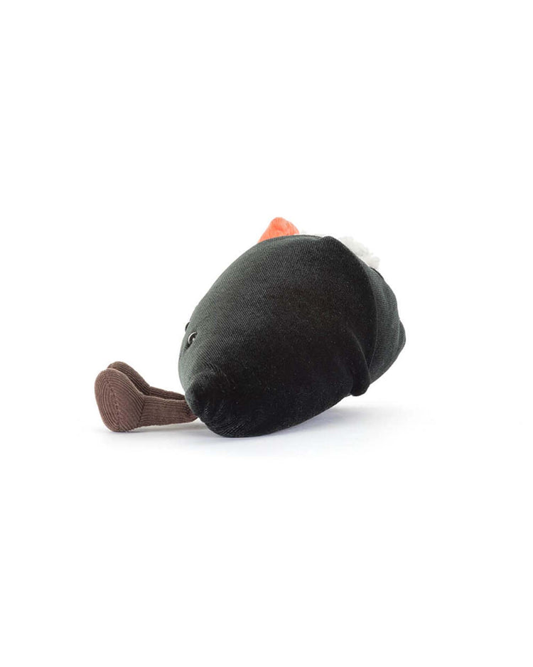 The Jellycat Amuseables Coneroi Temaki is a plush sushi roll toy with a black body, white top, orange accent, and brown legs, shown lying on its side against a white background.