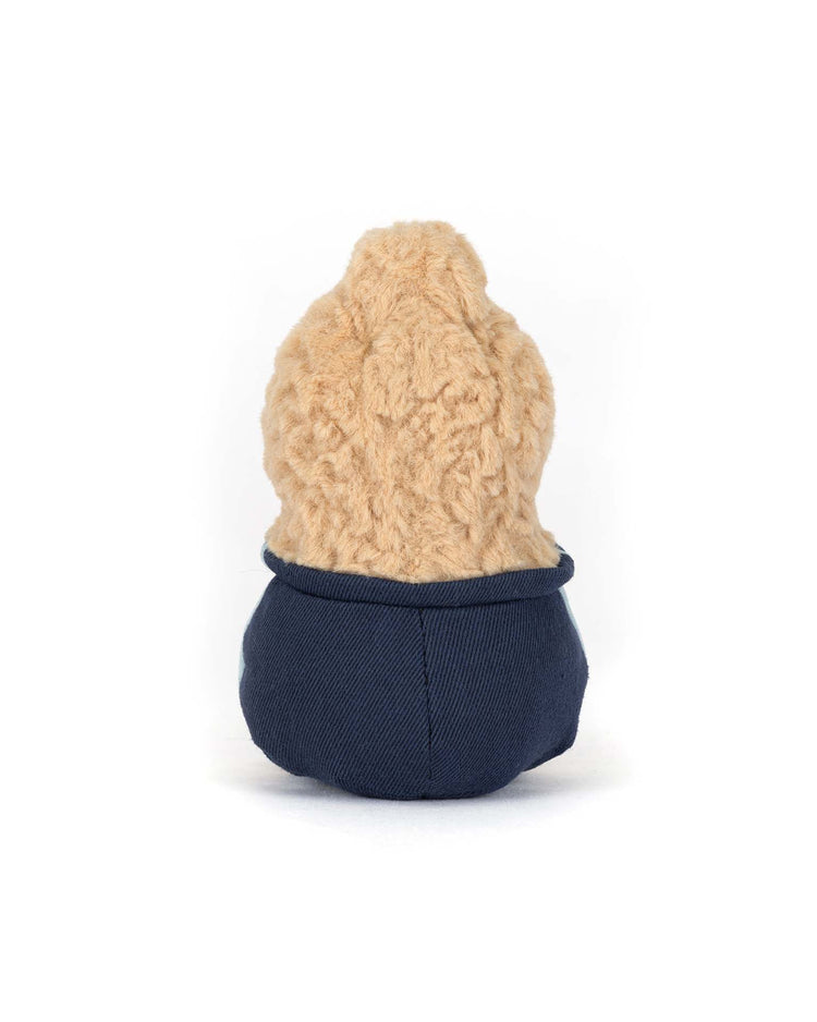 A Jellycat Amuseables Peanut Star Student Outfit plush is shown from the back, dressed in dark blue pants. Its features aren't visible from this angle, and it sits against a plain white background.
