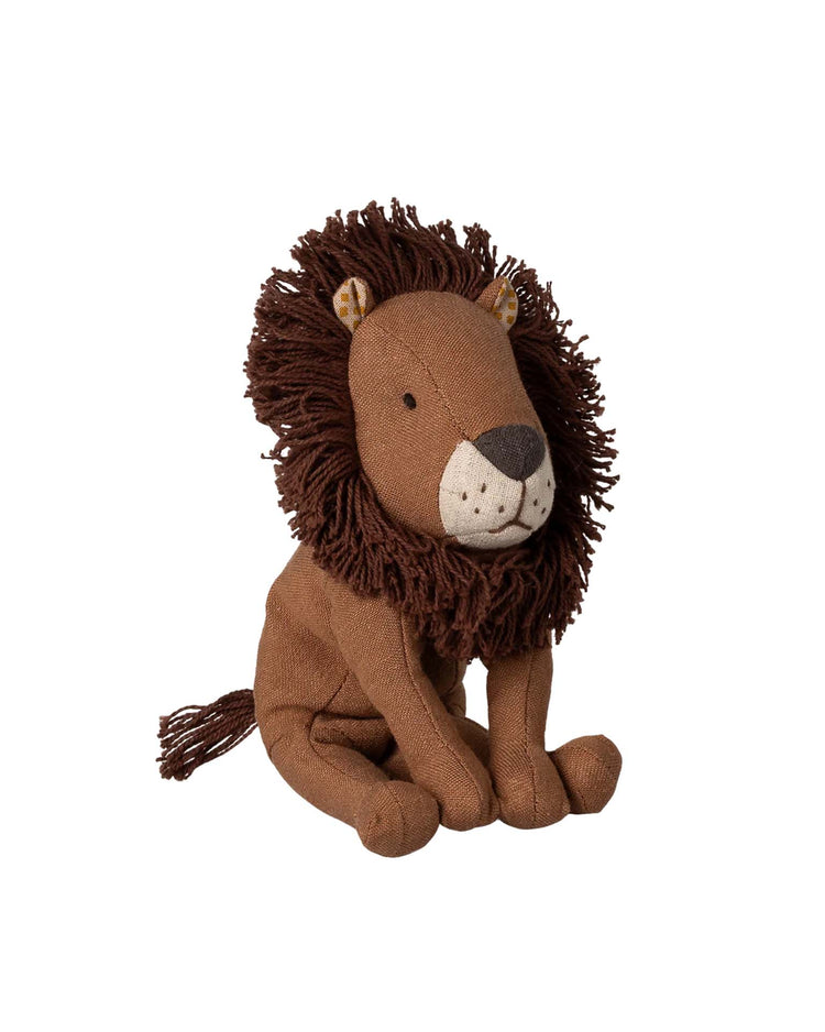 Meet little leo by maileg—a small lion toy made from recycled polyester plush, featuring a brown mane, beige snout, and stitched details, shown sitting upright against a white background.