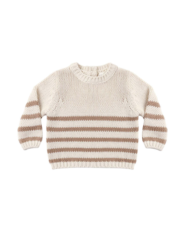 The rex sweater in almond stripe by quincy mae is a beige, long-sleeve knit crafted from organic cotton, featuring horizontal almond stripes along the lower body and sleeves, shown laid flat on a white background.
