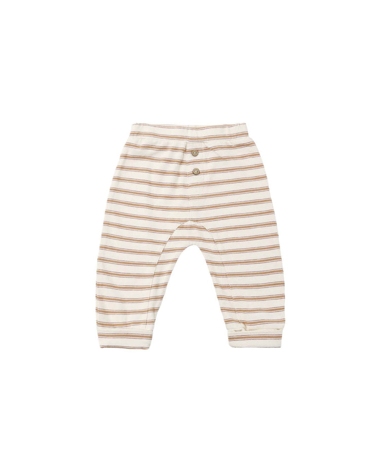 The PREORDER baby cru pant in fawn stripe by rylee + cru, featuring a relaxed fit and cream hue with horizontal tan stripes, has an elastic waistband with two front buttons. Crafted from 100% cotton for softness, the pants are shown laid flat on a white background.