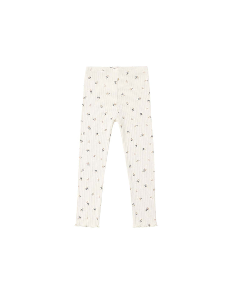 Child-size PREORDER legging in natural ditsy by rylee + cru, featuring a cream-colored ribbed knit fabric with a small floral print and subtle ruffled hems, displayed on a white background.