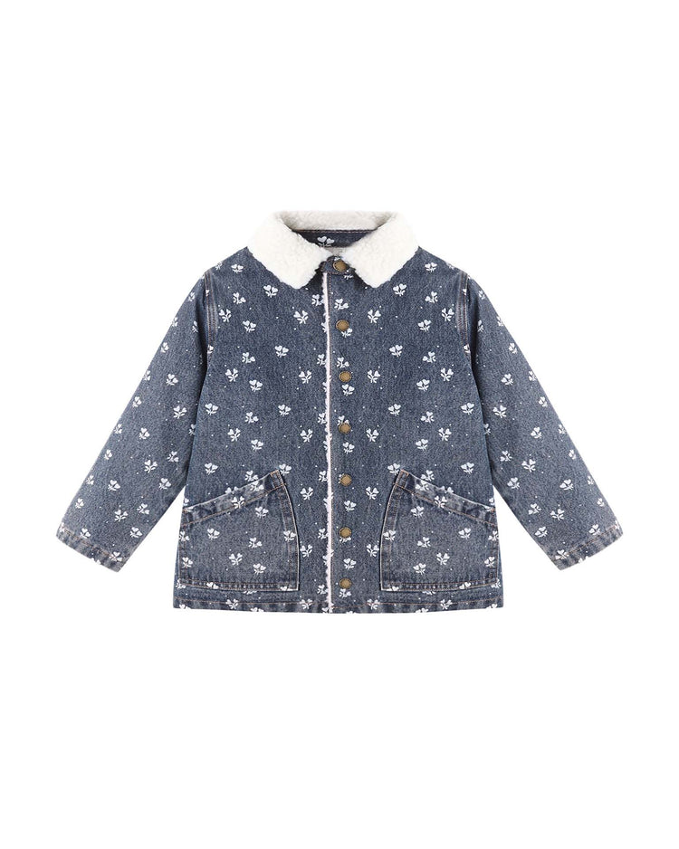 Long chore coat in heart ditsy by rylee + cru, featuring blue indigo denim with a white heart ditsy print, complemented by a soft sherpa collar and large front pockets. The front button closure and cozy shearling lining give it the warmth of an autumn-winter coat. Shown laid flat on a white background.