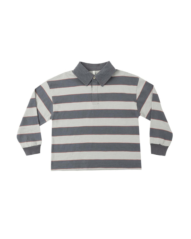 The rylee + cru rugby polo in sage stripe features wide horizontal sage and white stripes, a dark sage collar, and a partial button placket, crafted from 100% cotton for comfort and durability.