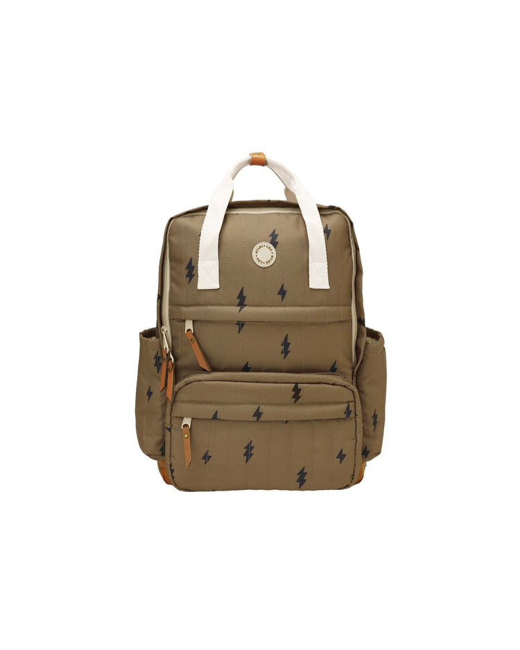Introducing the "backpack in bolts" by rylee + cru—a khaki-hued backpack made from sturdy polyester, accented with white handles, brown zippers, and bold black lightning bolt prints. Designed for daily adventures, it features two convenient side pockets and a circular logo patch on the front.
