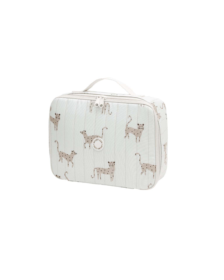 The rylee + cru lunch bag in leopard is a rectangular, light blue insulated bag featuring a zipper closure, a small top handle, and an illustrated pattern of beige leopards with spots and long tails.