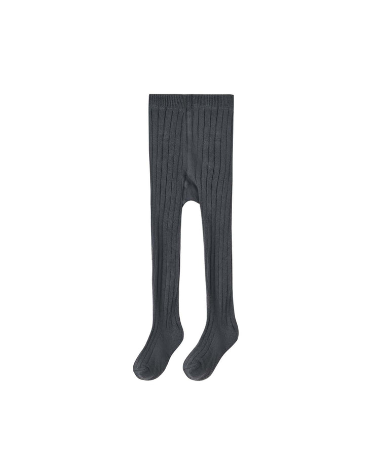 Rylee + Cru’s ribbed tights in midnight are laid flat on a white background, perfect for adding a cozy touch to your winter wardrobe.
