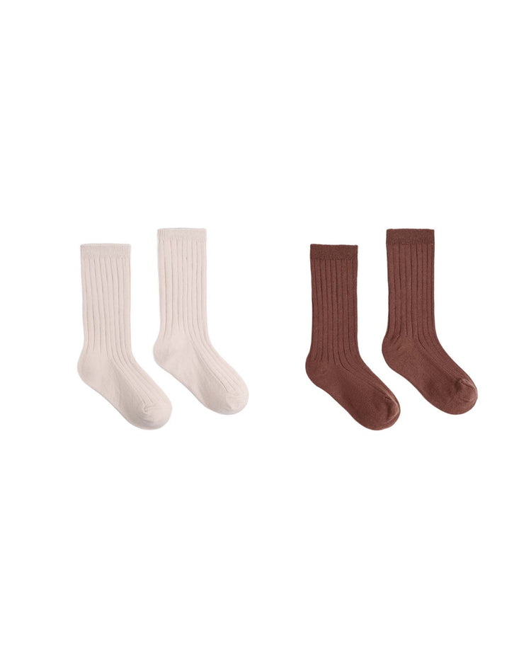 Two pairs of ribbed socks from rylee + cru, shown on a white background. The left pair is in the Petal shade and the right pair in Mulberry, making them perfect cozy socks for everyday wear.