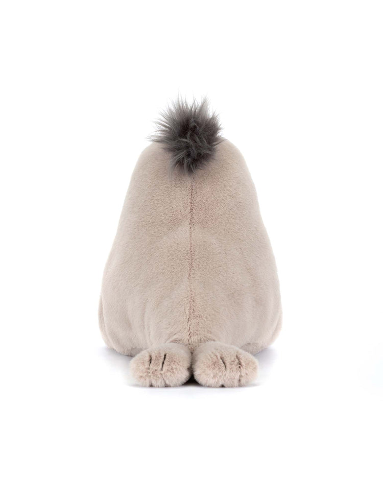A plush toy resembling a sea lion from Jellycat's Roarwell line is shown from behind, displaying small fins and a fluffy tail on a white background—an adorable addition to any stuffed animal collection.