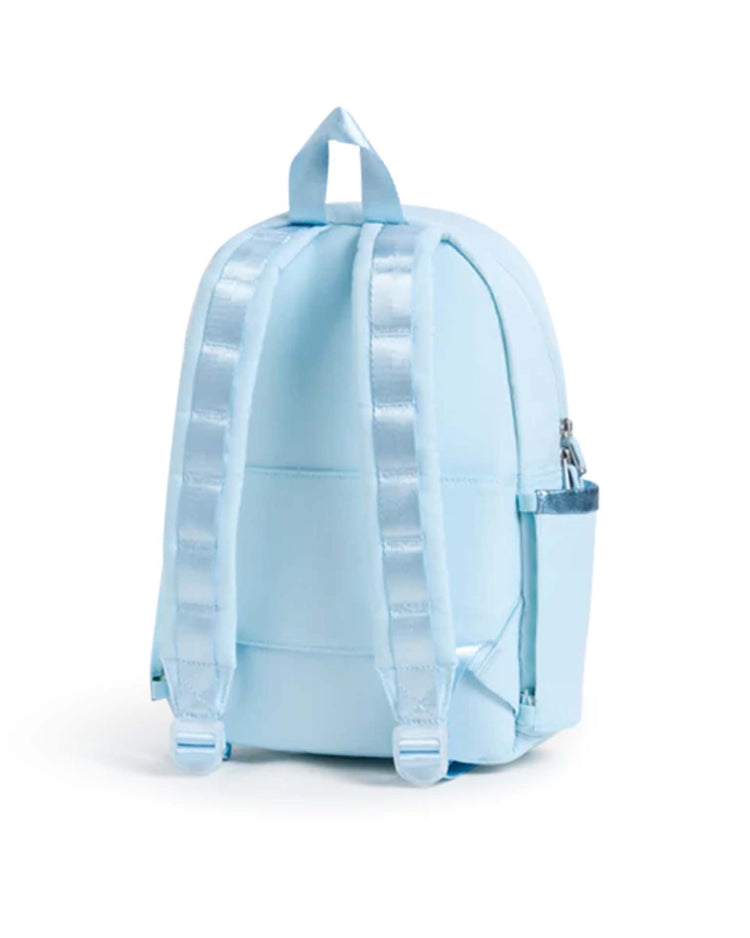 A State Bags Kane Mini Backpack in Rainbow Cloud, featuring adjustable padded shoulder straps, a top handle, and a small side pocket, is photographed from the back against a white background.