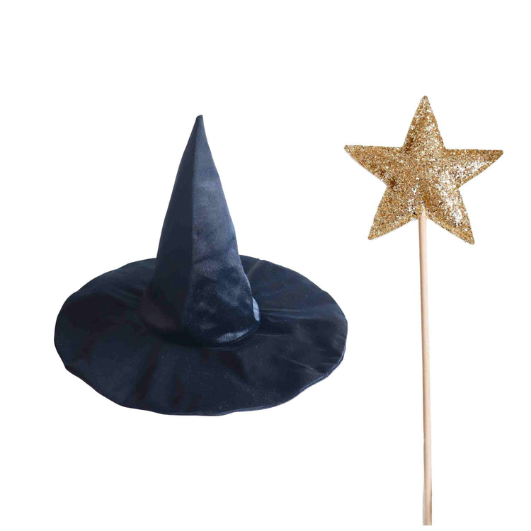 The Spellbound Witch Costume Set in Black by Bailey and Ava features a velvet witch hat and a gold glittery star wand on a white background, perfect as enchanting accents.