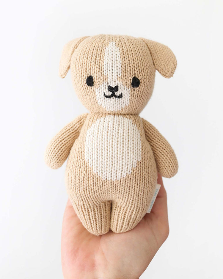 Little cuddle + kind play baby puppy
