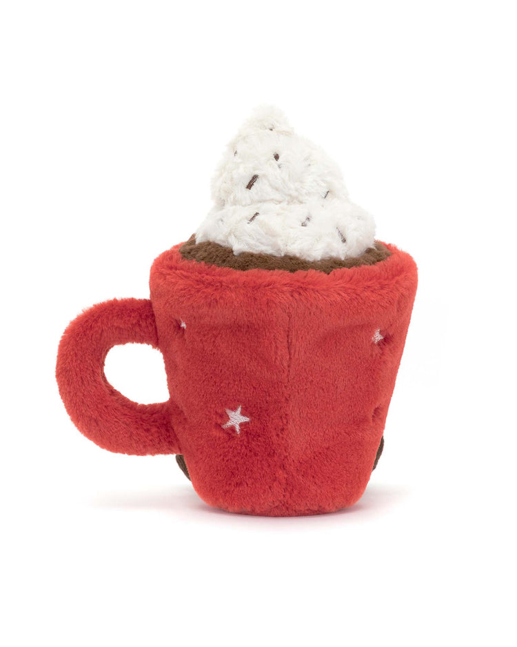 Introducing Jellycat's Amuseable Hot Chocolate, a plush toy shaped like a red cup with a white whipped topping and brown base, complete with a handle and star patterns. This soft cocoa treat provides cozy comfort for all ages.