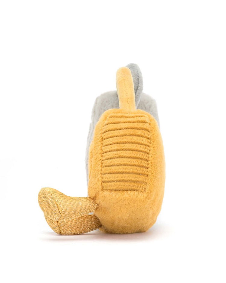 Jellycat's Amuseable Love Locks collection features this plush toy of a banana with a grey peel, viewed from behind with part of the yellow peel opened. It is perfect for adorable displays or as an endearing addition to your cute couple-themed décor.