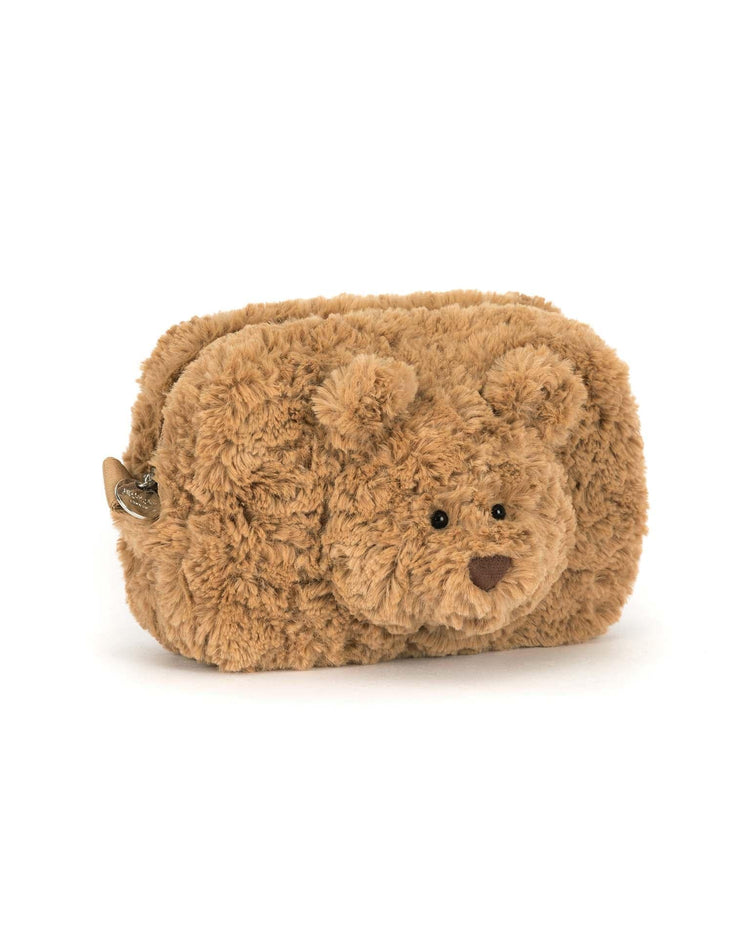 The jellycat bartholomew bear pouch is a rectangular brown zippered bag featuring Bartholomew Bears cute face and ears on the front.