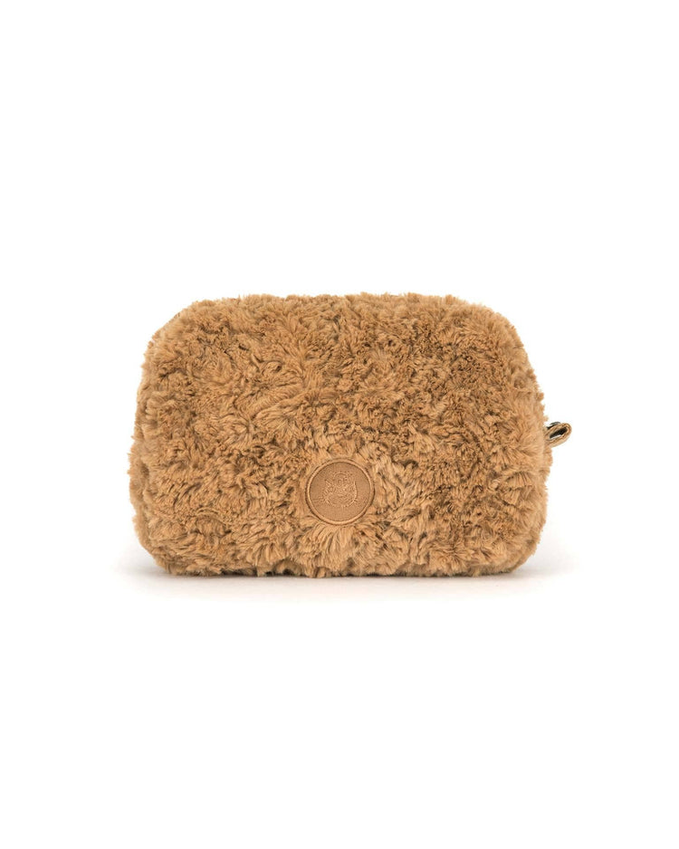 The jellycat Bartholomew Bear pouch is a small, rectangular, tan accessory featuring a leather patch and zipper, shown on a plain white background.