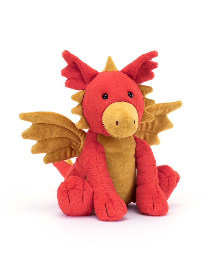 A charming Darvin Dragon plush by Jellycat, featuring red and orange wings, a yellow belly, and a cute expression, sits against a white background.