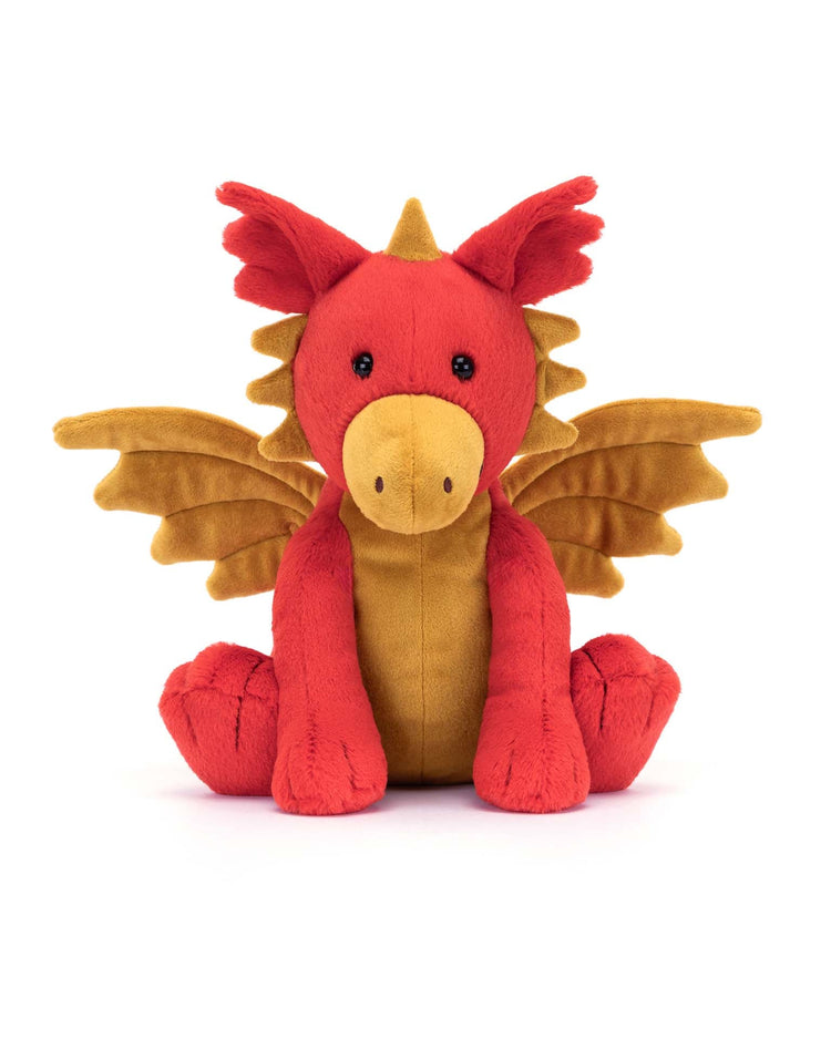 The Darvin Dragon plush from Jellycat, featuring a charming design with red and orange hues and golden wings, sitting upright against a white background, makes for an adorable stuffed animal.