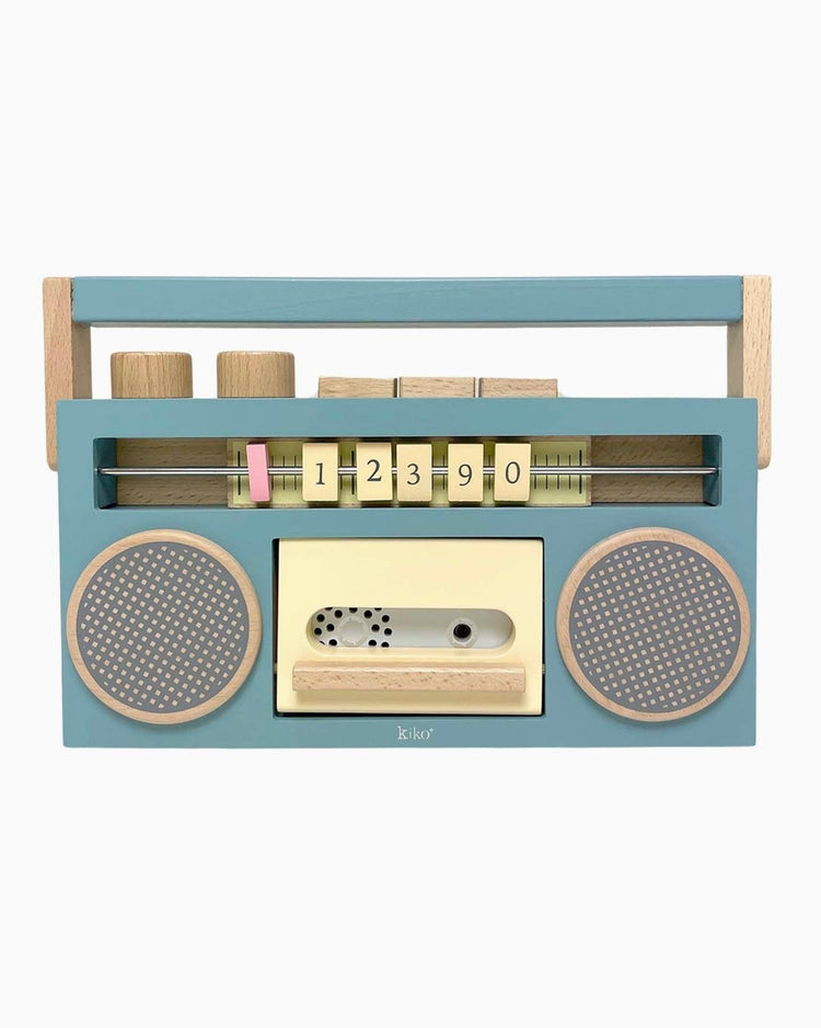 Little kiko+ and gg* play wooden tape recorder in blue