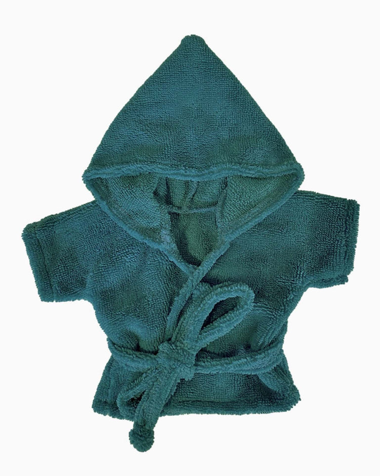 A small, child's terrycloth bathrobe in peacock green by minikane, complete with a hood and belt tie, is displayed on a plain white background, reminiscent of the cozy attire often seen on Paola Reina dolls.