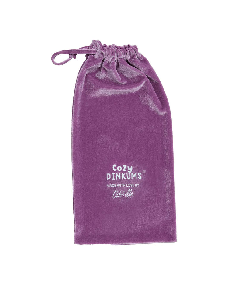 A lilac velvet drawstring bag with dinkum dolls' Cozy Dinkums™ Made with Love printed in white—ideal for storing your cozy dinkum unicorn sweetpea lilac or other plush friends.