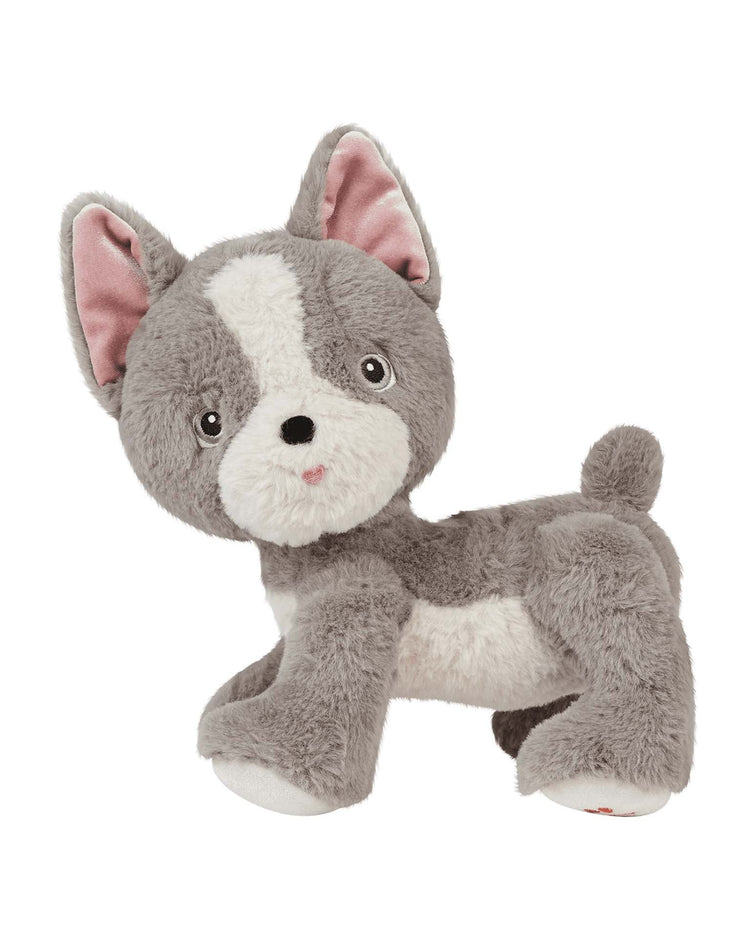 Dinkum Dolls' Dinkum Dog Gizmo is a plush, recycled dog toy with gray and white fur, big round eyes, upright pink-lined ears, a small tail, and a magnetic bone accessory—all shown against a white background.