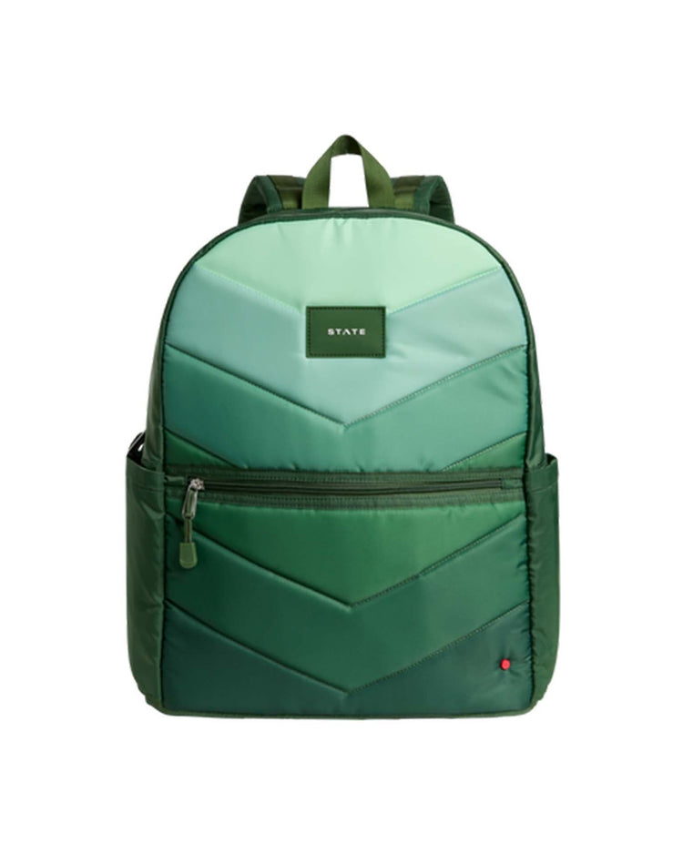 The Kane Kids Large Double Pocket Backpack in Olive Chevron by STATE Bags features quilted chevron patterns, organizational zip pockets, a front zipper pocket, top handle, adjustable straps, and a STATE label on the front.