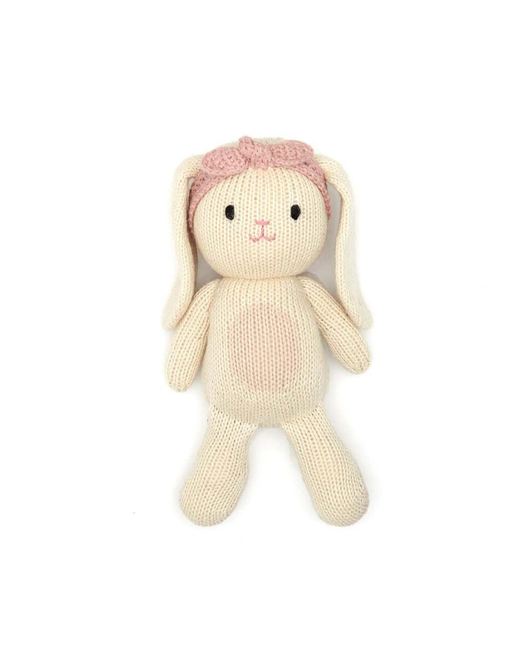 Little tun tun play baby bunny girl in natural