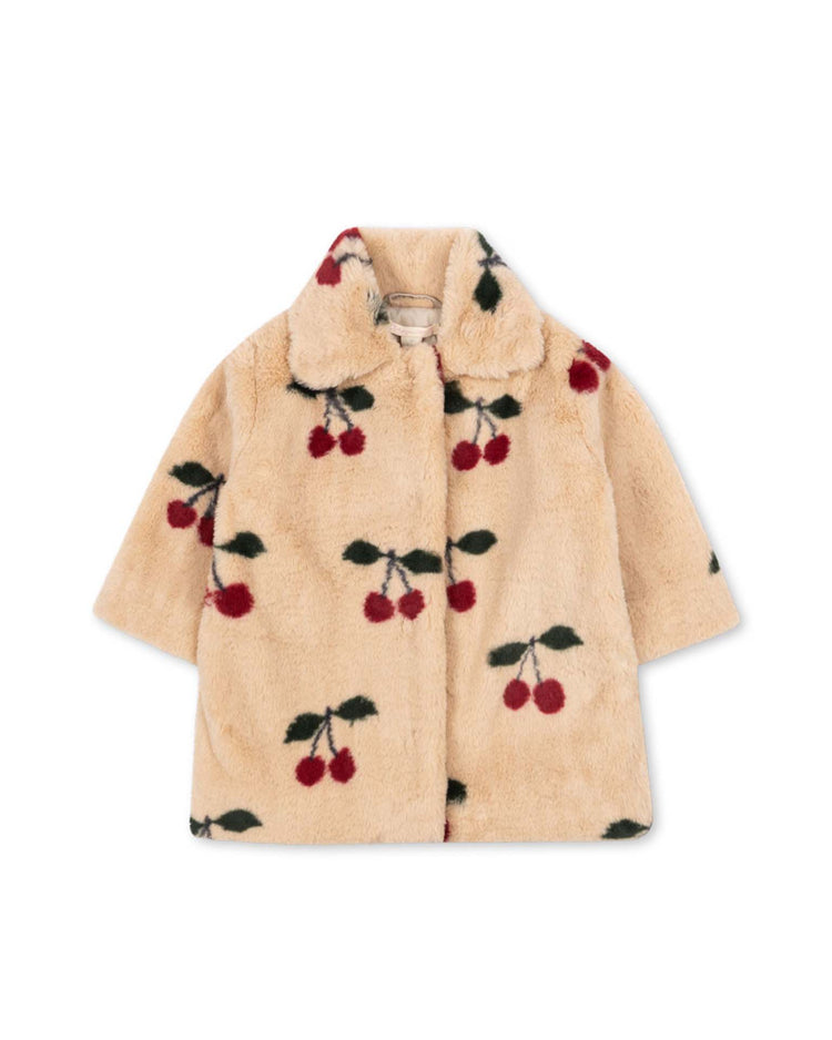 Introducing the "fuzzie coat in ma grande cerise" by konges sløjd—a beige plush children's coat crafted from GRS-certified polyester, adorned with a delightful cherry pattern featuring red cherries and green leaves scattered throughout. The design includes a rounded collar for added charm.