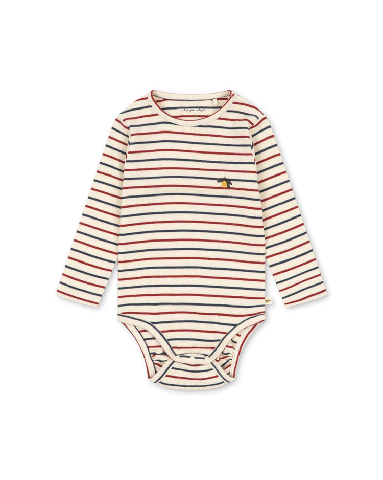 The voco modal bodysuit in tricolore bleu by konges sløjd features long sleeves, blue, red, and white horizontal stripes, a small yellow penguin logo on the left chest, and convenient snap closures at the bottom.