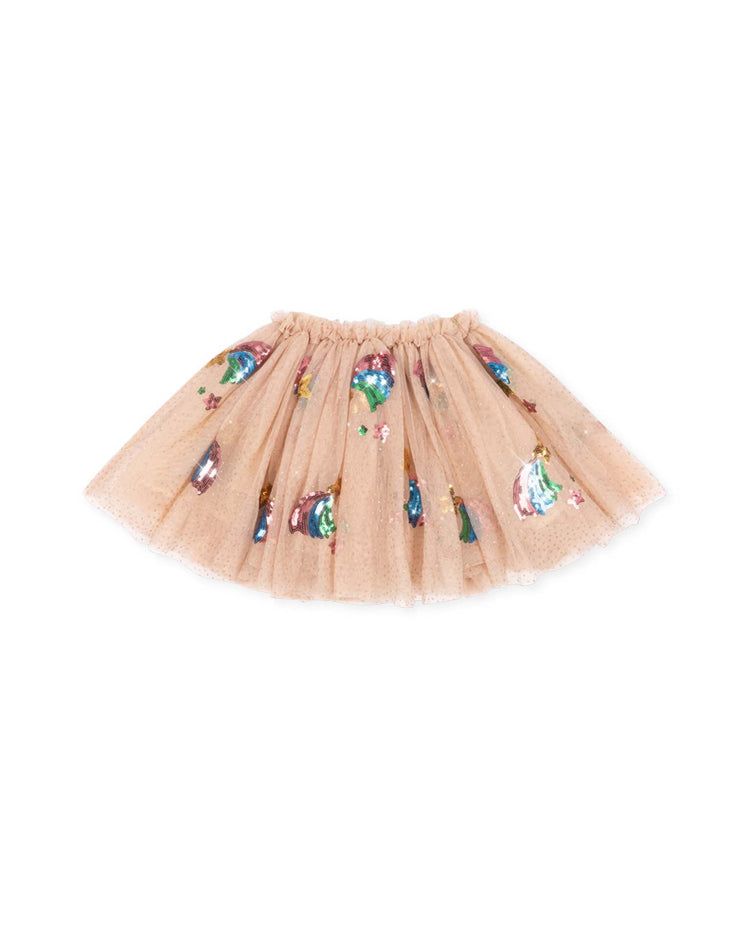 The yvonne skirt in rainbow star by konges sløjd is a peach-colored tulle skirt featuring a gathered waistband, made from recycled polyester and adorned with colorful star-shaped sequined patches for a playful and eco-friendly twist on the classic sequin skirt.