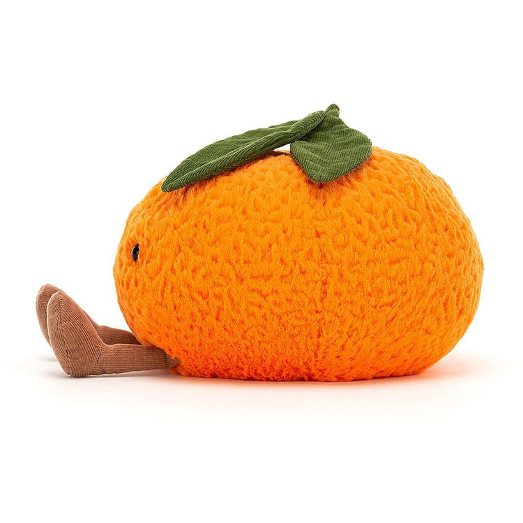 A small Jellycat Amuseable Clementine with a leaf on it.