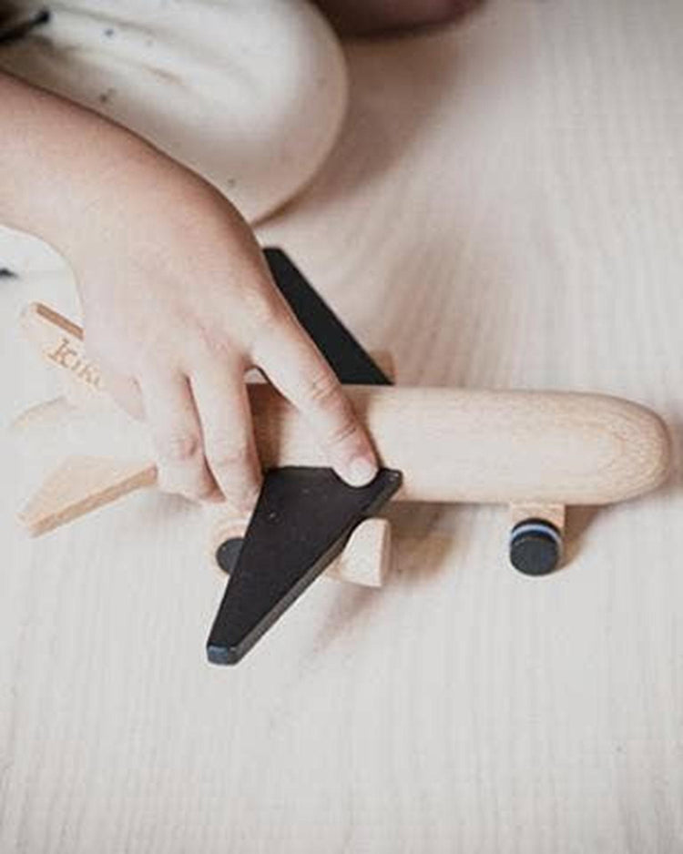 Little kiko+ and gg* play hikoki wooden wind-up plane in black