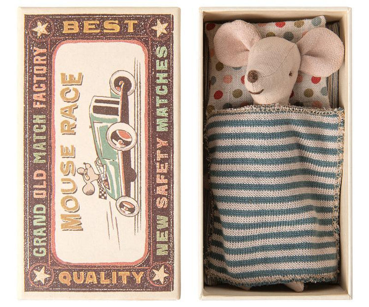 A big brother mouse in a matchbox with the words best mouse race by Maileg.