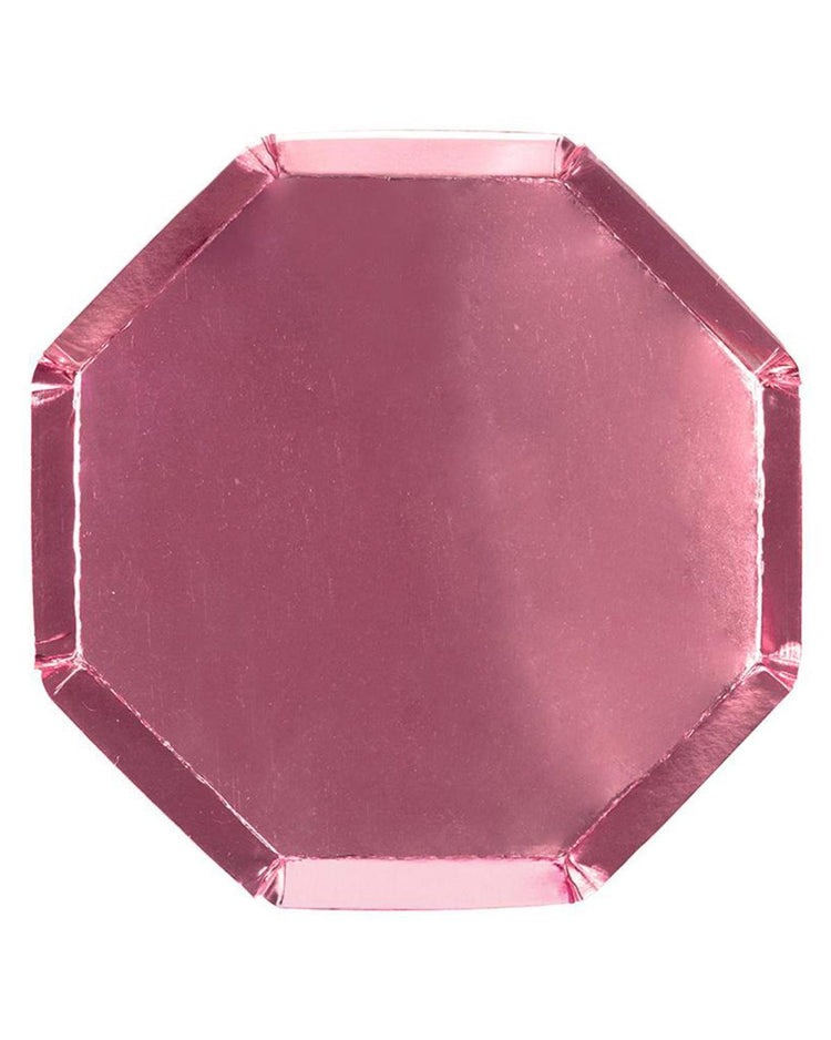 A meri meri pink foil side plate with an octagonal shape and slightly raised edges is shown on a white background.
