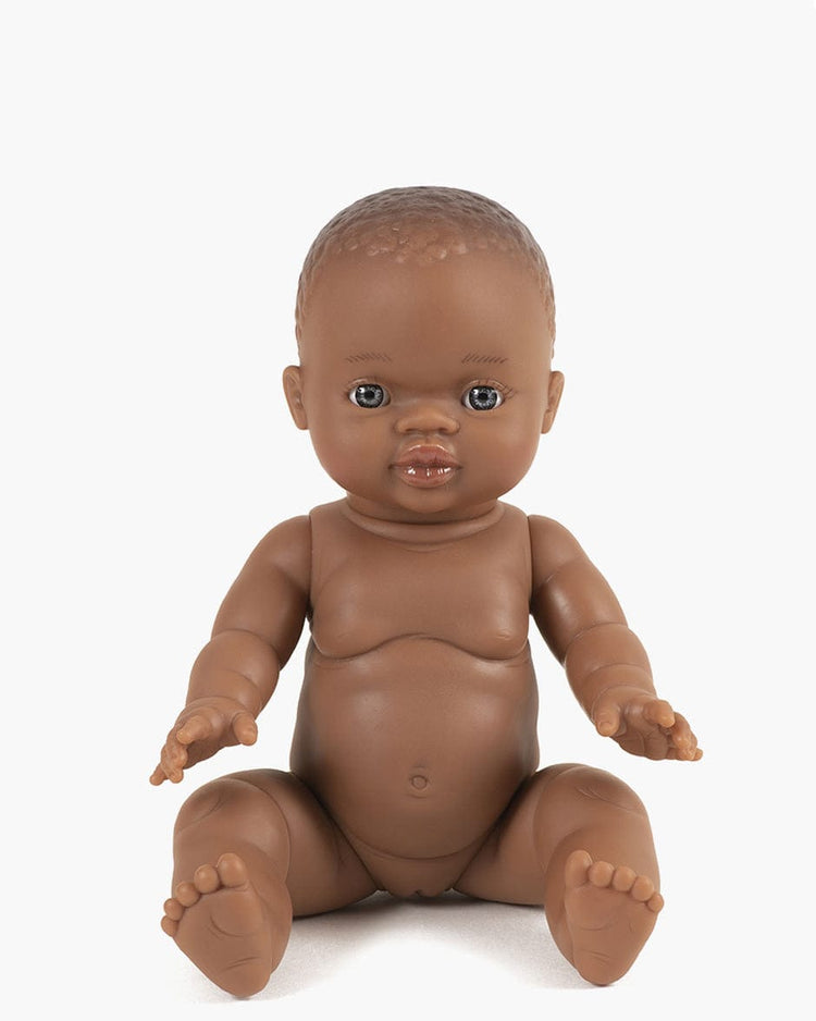 Little minikane play black girl doll with light eyes