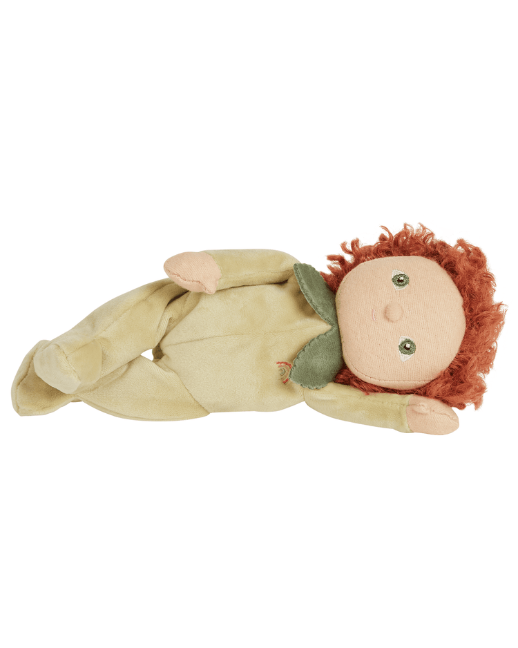 Meet Dinky Dinkums Patty Pear by Dinkum Dolls—a palm-sized, limited-edition plush with curly red hair, light tan skin, button-like eyes, a green collar, and beige outfit, lying on its side with one arm raised.