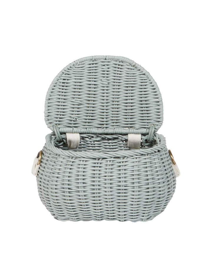 A vintage blue woven wicker dinkum dolls mini chari bag with a rounded shape, lid open, and two small side handles—ideal as a stylish bike basket or cute storage.