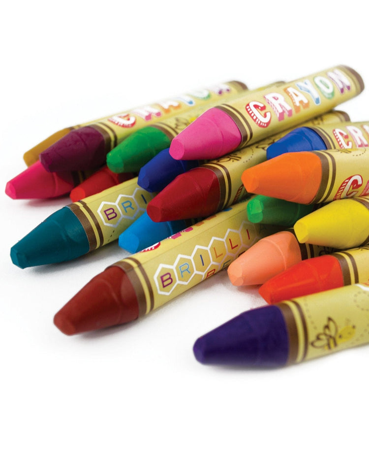A group of Brilliant Bee crayons with a triangle barrel on a white background.