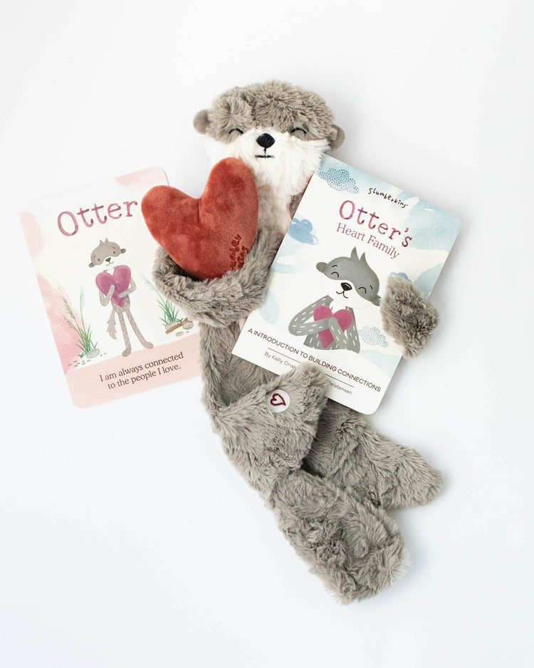 Little slumberkins play pebble otter snuggler - family bonding
