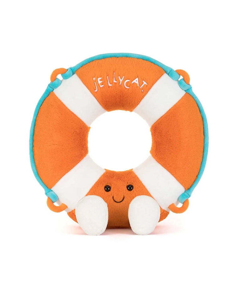The Jellycat Amuseables Life Ring is a plush toy shaped like an orange and white rescue float with blue trim, smiling face, arms, and feet. “Amuseables Life Ring” is embroidered on top. Background is white.