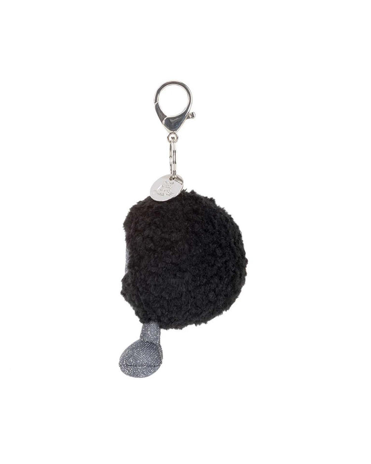 The amuseables black hole bag charm by jellycat is a black, fluffy pom-pom keychain with a silver lobster clasp, small silver tag, and textured gray fabric detail—an ideal physics-inspired gift for space lovers.