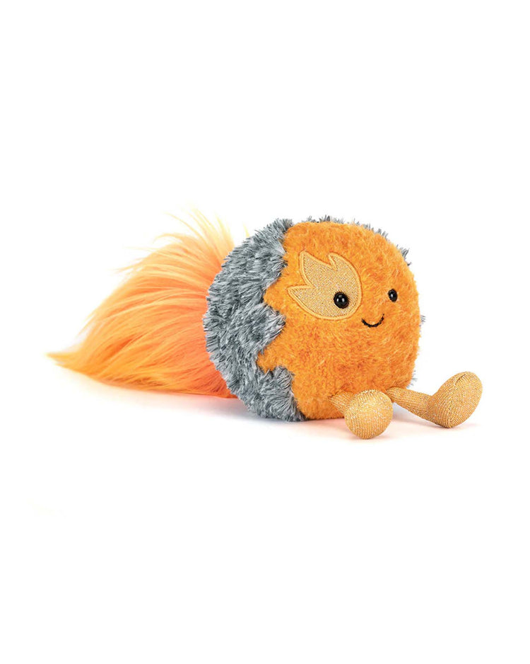 Meet the Jellycat Amuseables Space Comet: a plush toy with a round, fuzzy orange and gray body, embroidered eyes and smile, golden fabric legs, and a fluffy orange tail—your cuddly cosmic companion!.