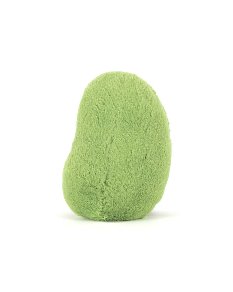The Jellycat Amuseables Soyella Edamame Bean plush is a light green, oval-shaped soft toy with subtle center stitching, designed to resemble a green edamame bean and shown from the back.