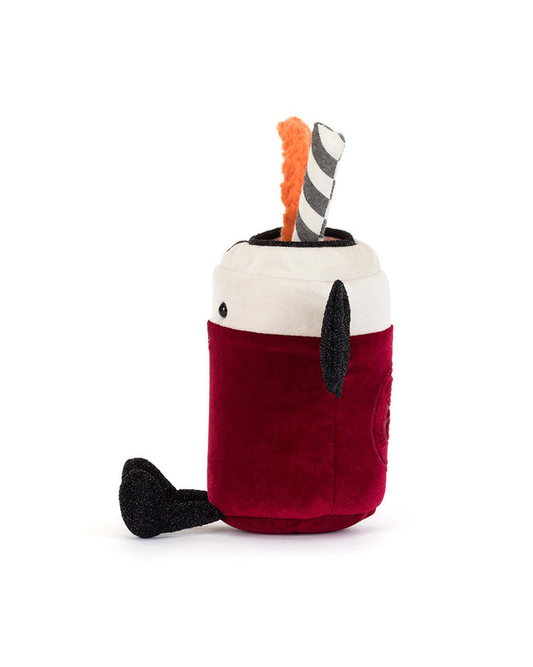 Meet the Jellycat Amuseables Vampop Drink: a whimsical plush toy shaped like a red soda can, complete with a black straw and an orange pipe-cleaner accent poking out of the top. With its adorable eyes and quirky black limb, this Halloween-themed plush from Jellycat makes a delightful gift for anyone who appreciates charming surprises.