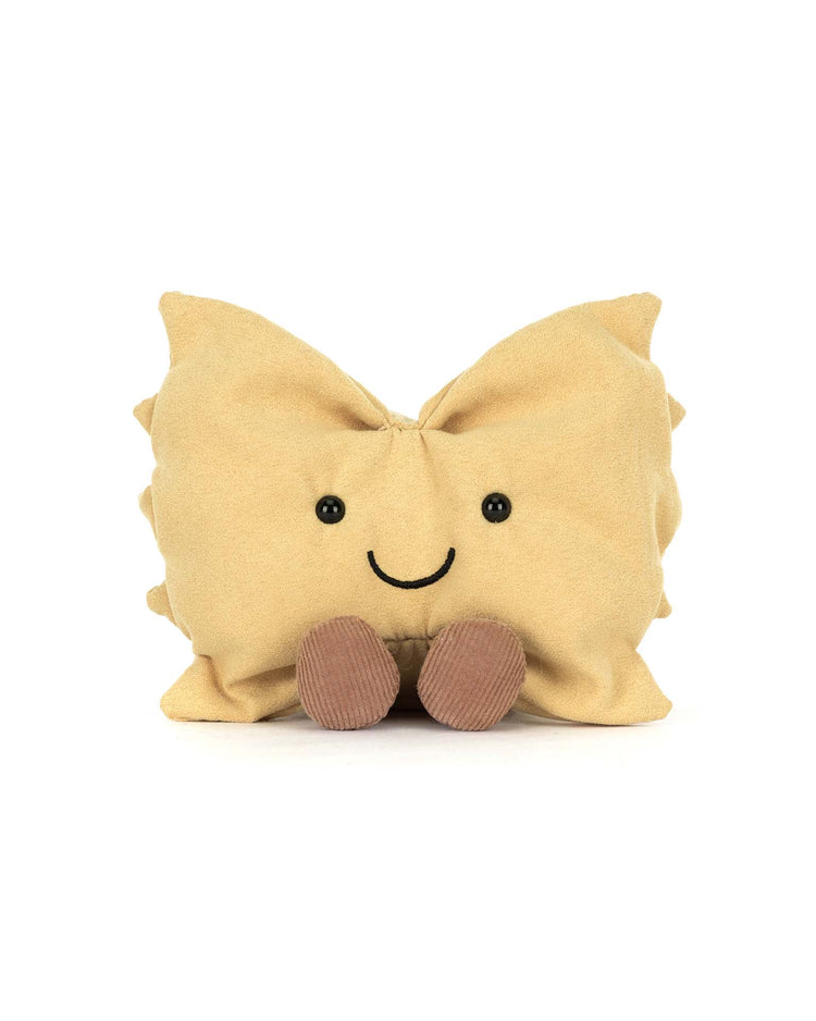 The Jellycat Amuseables Farfalle is a plush toy shaped like a dumpling with a smiling face and brown feet, evoking cheerful pasta dinner memories against a crisp white background.