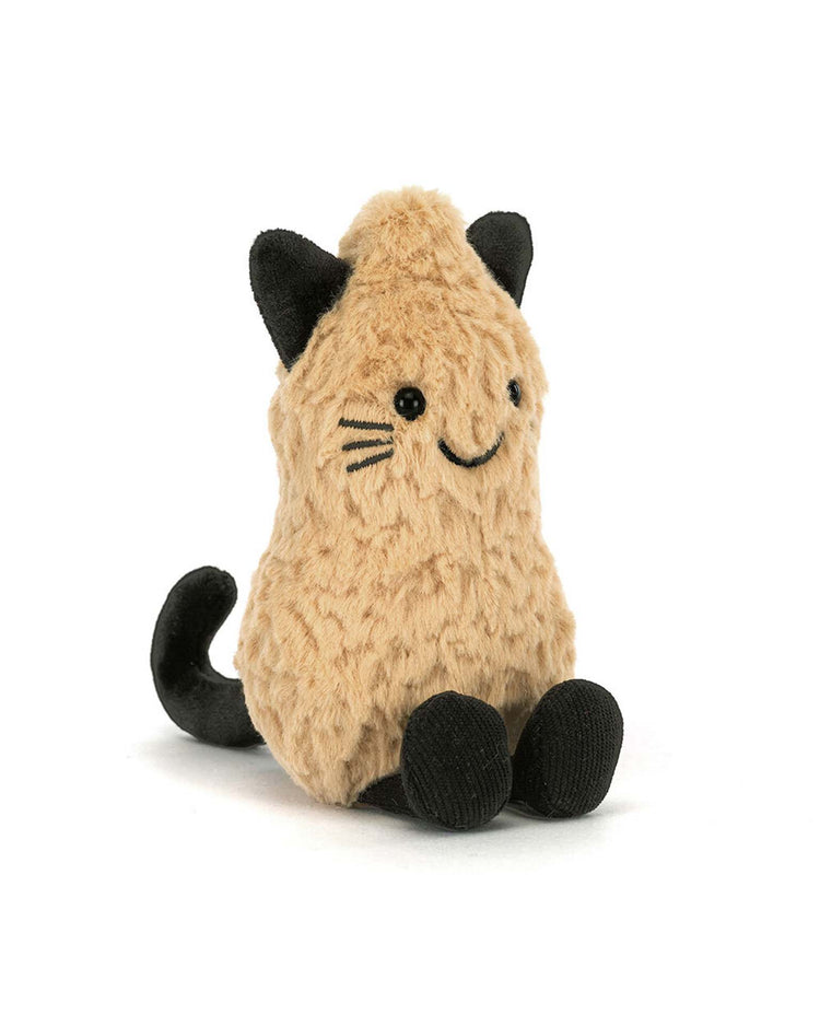 The Jellycat Amuseables Peanut Cat Outfit is a plush toy shaped like a tan peanut, dressed in an adorable cat costume with black ears, tail, and feet. Featuring stitched black eyes, whiskers, and a smiling mouth, this charming Jellycat creation sits upright on a white background—perfect for cuddling or display.
