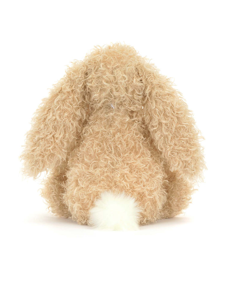 The Jellycat Bashful Luxe Bunny Curly Original plush features curly beige fur, floppy ears, and a fluffy cream bobtail—an ideal cuddly companion shown from the back against a white background.