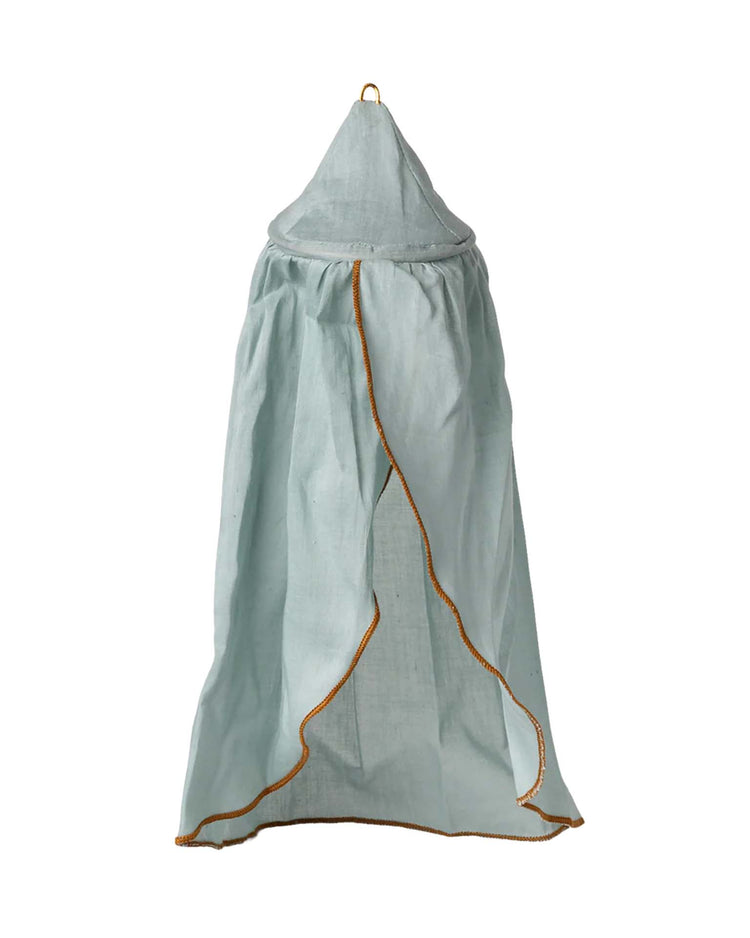 The maileg miniature bed canopy in mint features a conical top and gold trim, designed to hang from the ceiling and create a tent-like cover—perfect for dollhouses or pairing with other Maileg accessories.